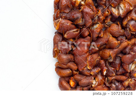 Sour tamarind on white background. Sour tamarind on white background. 107259228