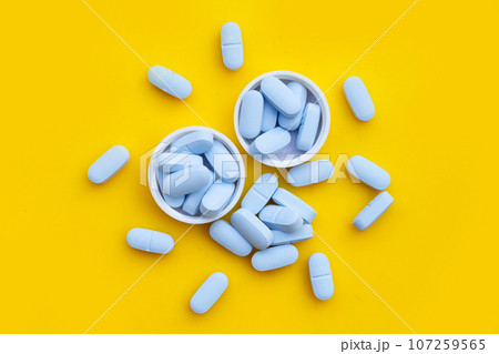"PrEP" ( Pre-Exposure Prophylaxis) used to help protect people from HIV, yellow background. 107259565