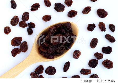 Dried grape on white background. Dried grape on white background. 107259583