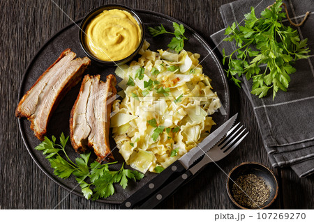 Haluski, fried cabbage, noodles with roast ribs Haluski, fried cabbage, noodles with roast ribs 107269270