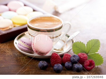 Macaroon on a wooden background 107269946