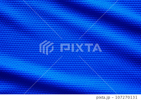 Blue football jersey clothing fabric texture sports wear background, close up top view Blue football jersey clothing fabric texture sports wear background, close up top view 107270131