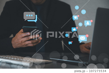 Living the digital life on vacation with smartphone. Social media concept of data analysis, content creation, and online networking. Social Distancing and Working From Home. Social media concept 107273534