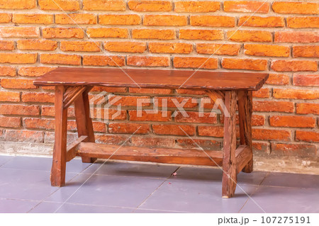 Long wooden chair 107275191