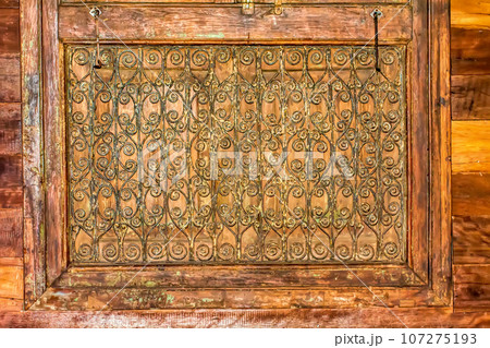 Antique carved wooden windows Antique carved wooden windows 107275193