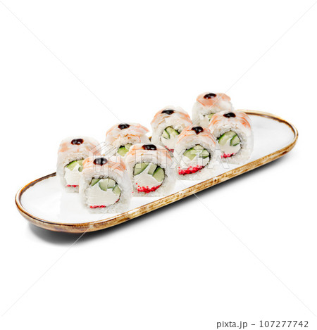 asian food - sushi roll with shrimp, cucumber and masago caviar. asian food - sushi roll with shrimp, cucumber and masago caviar. 107277742