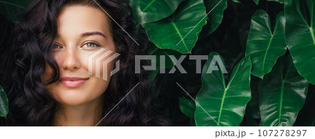 Natural Beauty Portrait of Young Model Among Exotic Tropical Foliage Natural Beauty Portrait of Young Model Among Exotic Tropical Foliage 107278297