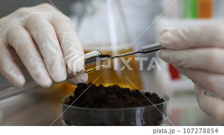 Worker in protective gloves Worker in protective gloves 107278854