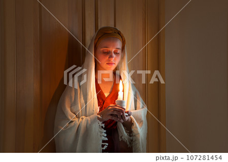 Young pretty gitj whith candle 107281454