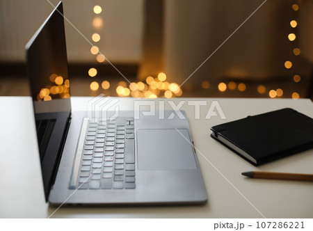 Desk office with laptop on the table. Home office. Inspiration moment, workspace in the morning. selective focus. 107286221