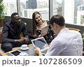 Happiness business team Colleagues talking talking and discuss in cafe during break in restaurant. 107286509