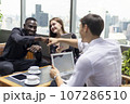 Happiness business team Colleagues talking talking and discuss in cafe during break in restaurant. 107286510