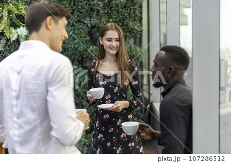 Happiness business team Colleagues talking talking and discuss in cafe during break in restaurant. 107286512