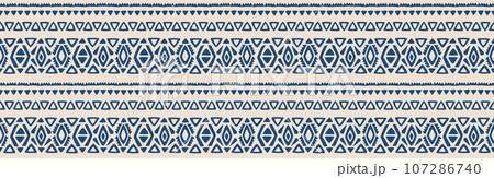 Ethnic abstract ikat art. Seamless pattern in tribal, folk embroidery, and Mexican style. Aztec geometric art ornament print. Design for carpet, wallpaper, clothing, wrapping, fabric, cover, textile. Ethnic abstract ikat art. Seamless pattern in tribal, folk embroidery, and Mexican style. Aztec geometric art ornament print. Design for carpet, wallpaper, clothing, wrapping, fabric, cover, textile. 107286740