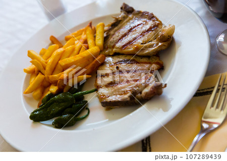 Juicy grilled meat cutlet Juicy grilled meat cutlet 107289439