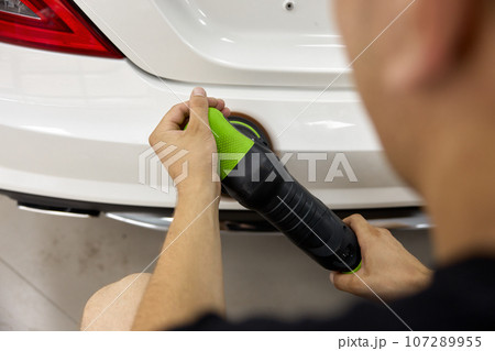 Man car service worker using polishing machine for paint coating renovation Man car service worker using polishing machine for paint coating renovation 107289955