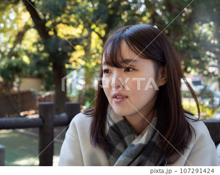 A Beautiful young Japanese woman looking off camera 107291424