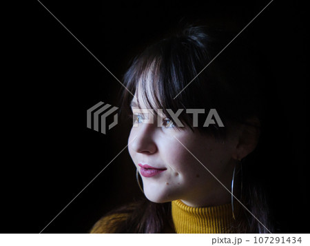 A beautiful young woman posing for portraits 107291434