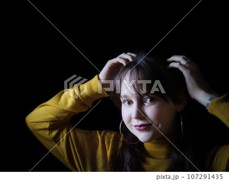 A beautiful young woman posing for portraits A beautiful young woman posing for portraits 107291435