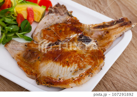 Fried pork loin with salad Fried pork loin with salad 107291892