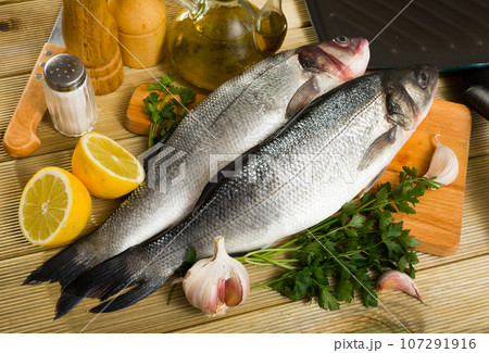 Two raw sea bass fish Two raw sea bass fish 107291916