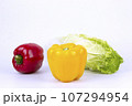 Vegetarian and vegan healthy lifestyle concept. Raw vegetables and fruits with empty plate over rustic background 107294954