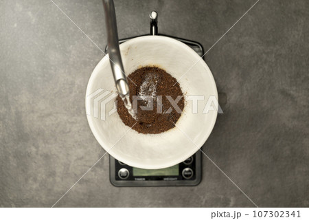 Serves coffee with a V60 dripper coffee maker 107302341