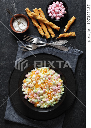 Ambrosia Salad in black bowl, top view Ambrosia Salad in black bowl, top view 107305187