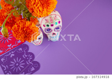 Day of the dead. Dia De Los Muertos celebration background. Sugar Skull, marigolds or cempasuchil flowers. Day of the dead. Dia De Los Muertos celebration background. Sugar Skull, marigolds or cempasuchil flowers. 107314918