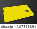 Green plastic bank card on a gray background. Mockup. Plastic card with chip. 107316891