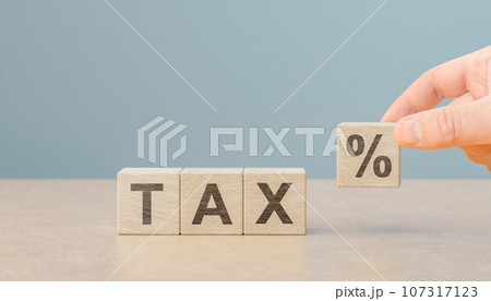 tax percent on wooden cubes. taxes paid by individuals and corporations such as VAT, income tax and property tax. Financial research,government taxes and calculation tax return concept tax percent on wooden cubes. taxes paid by individuals and corporations such as VAT, income tax and property tax. Financial research,government taxes and calculation tax return concept 107317123
