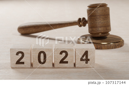 2024 New Year and judge's gavel on table. Justice, Law, lawyer, judgment, justice auction and bidding concept. new laws in year 2024. 2024 New Year and judge's gavel on table. Justice, Law, lawyer, judgment, justice auction and bidding concept. new laws in year 2024. 107317144
