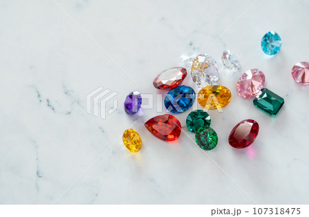 Jewel or gems on white background, Collection of many different natural gemstones 107318475