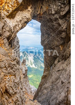 Prisojnik or Prisank Window. The larges rock window in Alps, Triglav National Park, Julian Alps, Slovenia 107319441