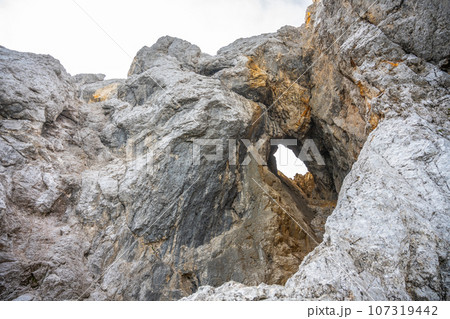 Prisojnik or Prisank Window. The larges rock window in Alps, Triglav National Park, Julian Alps, Slovenia 107319442