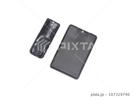 Pocket perfume on white background with selective focus Pocket perfume on white background with selective focus 107329740