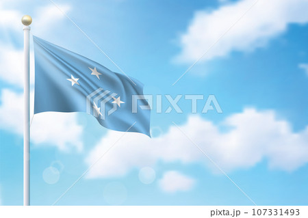 Waving flag of Micronesia on sky background. Template for independence Waving flag of Micronesia on sky background. Template for independence 107331493
