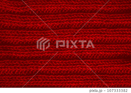 Handmade knit background with macro wool threads. 107333382