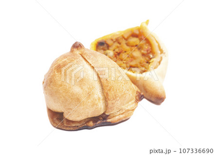 Indian samosa isolated on white background. Indian samosa isolated on white background. 107336690