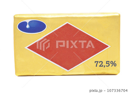Stick of wrapped butter isolated on white background 107336704