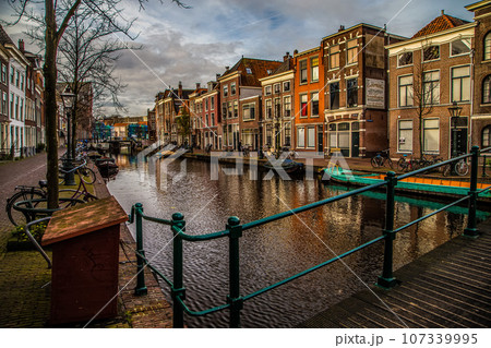 Cityscape of Amsterdam, old type buildings and channels Cityscape of Amsterdam, old type buildings and channels 107339995