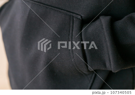 Close-up of cotton sweatshirt fabric texture clothes - design clothes tailoring and youth fashion concept 107340505