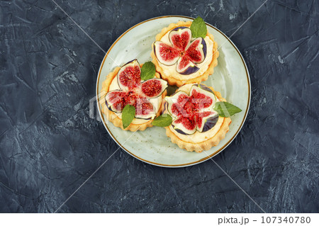Tartlets with cream and figs. Tartlets with cream and figs. 107340780