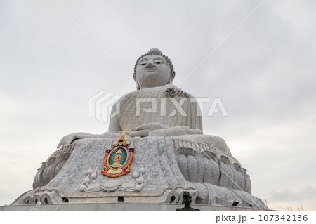 The largest white marble statue of the big buddha in the world on the island of phuket in thailand. Popular place among tourists. The largest white marble statue of the big buddha in the world on the island of phuket in thailand. Popular place among tourists. 107342136