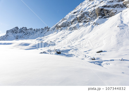 Winter Italy Dolomite mountains covered with snow  107344832