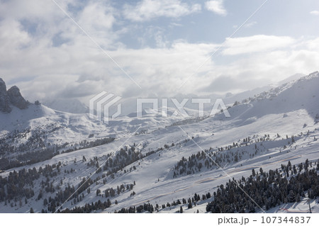 Winter Italy Dolomite mountains covered with snow Winter Italy Dolomite mountains covered with snow 107344837