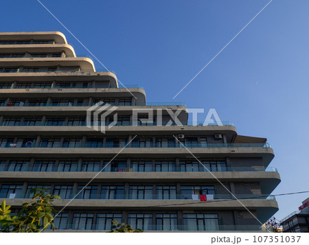 An old ladder-shaped hotel. Multi-tiered hotel building. Resort place. architecture of the south. An old ladder-shaped hotel. Multi-tiered hotel building. Resort place. architecture of the south. 107351037
