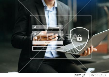 Cyber security concept, Login, User, identification information security and encryption, secure access to user's personal information woman using smart phone and tablet in office. 107359305