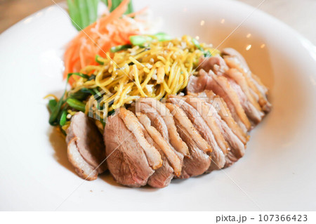 noodles with roasted duck 107366423