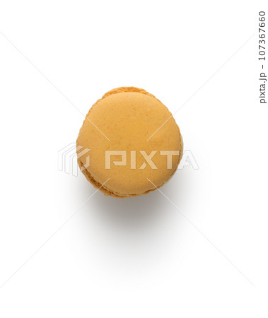 Orange french macaron top view isolated on white with shadow Orange french macaron top view isolated on white with shadow 107367660
